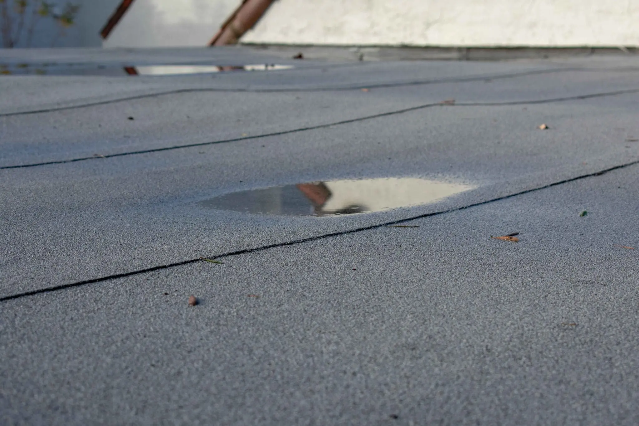 common reasons for flat roof leaks